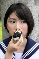 Ms. Natsuyo Ikekatsu is wearing a school uniform, and she is eating rice balls, she is a Japanese & Asian beautiful and cute model & actress.