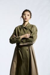 Ms. Akie Shibukawa is a beautiful Japanese & Asian fashion model, she wears a dark green dress.