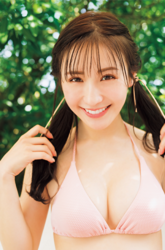 Ms. Emina Iori is a Japanese and Asian gravure idol (swimwear model, bikini model, pin-up girl), TV personality and singer, she is wearing a pink bikini, but the photo emphasizes her face.