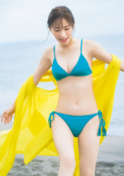 Ms. Emina is a Japanese and Asian gravure idol (swimwear model, bikini model, pin-up girl), TV personality and singer, she took off her yellow dress to reveal the blue bikini she was wearing.