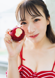 Ms. Emina Iori is a Japanese and Asian gravure idol (swimwear model, bikini model, pin-up girl), TV personality and singer, she is wearing a red leotard and is biting an apple and holding the bitten apple in her hand.
