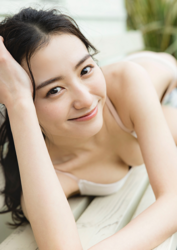 Ms. Mariho Kokei is a Japanese & Asian fashion model, swimsuit model (gravure idol / bikini model / pin-up girl), actress, and former idol, she lies face down on the bench.