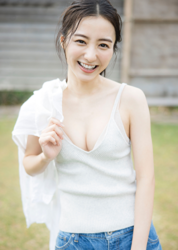 Ms. Mariho Kokei is a Japanese & Asian fashion model, swimsuit model (gravure idol), actress, and former idol, she wears a white shirt and light gray running shirt and wearing jeans and standing in the garden.