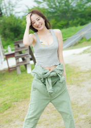 Ms. Mariho is a Japanese & Asian fashion model, swimsuit model (gravure idol / bikini model / pin-up girl), actress, and former idol, she wears a gray running shirt and green pants and she's on the ranch.