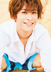 Mr. Ayato Akaibashi is wearing a white shirt and light blue shorts, he is also an actor and voice actor.