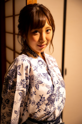 Ms. Kirina Hinaga is wearing a yukata and she is in a Japanese style room, she is a Japanese & Asian sweet and cute big breasts gravure idol (pin-up model, bikini model, swimsuit model), her bust is 90 cm, she has charming big breasts, she is a woman with sexual charm.