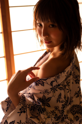 Ms. Kirina Hinaga wears a yukata and is in a Japanese-style room, she is a Japanese & Asian sweet and cute big breasts gravure idol (pin-up model, bikini model, swimsuit model), her bust is 90 cm, she has charming big breasts, she is a woman with sexual charm.