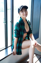 Ms. Yaaya Igeta is wearing a black hat, black lingerie, and a green and black checkered shirt, sitting by the window, she is a Japanese & Asian gravure idol (bikini model, swimsuit model, pin-up girl), actress, TV personality, her bust is 92 cm, she has attractive big breasts, she is a sexually attractive woman.