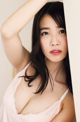 Ms. Kisara Amakura is a Japanese active idol, a very cute bikini model (gravure idol), an actress, and a TV personality, she is wearing white women's underwear and she is standing.