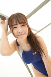 Ms. Kisara Amakura is a Japanese active idol, a very cute bikini model (gravure idol), an actress, and a TV personality, she wears a blue and gray mixed race swimsuit.