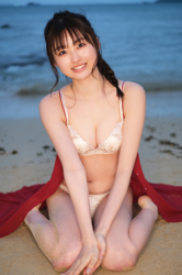 Ms. Makiko Tatsuhashi is wearing a white lingerie and sitting on the sandy beach, she is an active idol singer and gravure idol (bikini model, swimwear model).