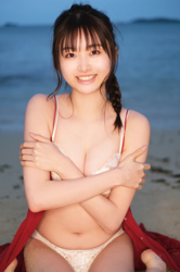 Ms. Makiko Tatsuhashi is wearing a white lingerie and sitting on the sandy beach, she is an active idol singer and gravure idol (bikini model, swimwear model).