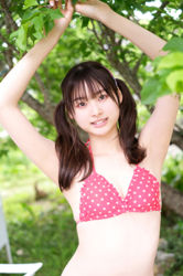 Ms. Makiko Tatsuhashi is wearing a red polka dot bikini and she is standing, she is an active idol singer and gravure idol (bikini model, swimwear model).