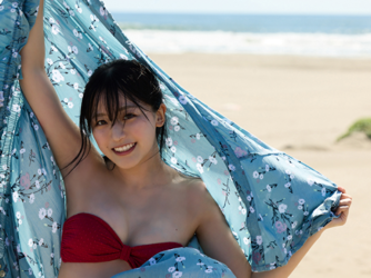 Ms. Uuna Tadekawa is a beautiful and cute young Japanese gravure idol (pin-up girl, swimwear model, bikini model), she is wearing a red bikini, standing outdoors, and spreading her blue garment.