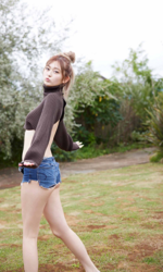 Ms. Yuki Furuhama is dressed in black and wears jeans shorts, she is standing outdoors in a garden, she is standing in the pool, she is a tall white gyaru Japanese fashion model, runway model, swimsuit model (gravure idol / pin up model / bikini model), TV personality, and YouTuber.