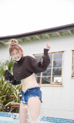 Ms. Yuki Furuhama is dressed in black and wearing jeans shorts, she is standing in the pool, she is a tall white gyaru Japanese fashion model, runway model, swimsuit model (gravure idol / pin up model / bikini model), TV personality, and YouTuber.